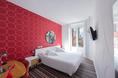 Cama o camas de una habitación en Posada del Dragón Boutique Hotel
