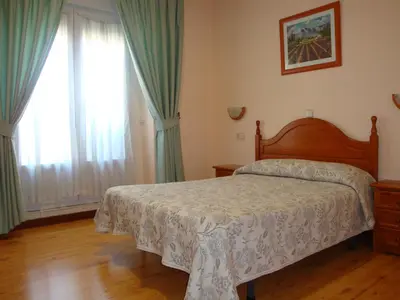 Cama o camas de una habitación en Hostal Zamora