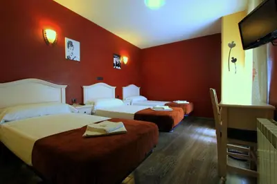 Cama o camas de una habitación en Hostal Regio