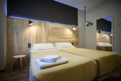 Cama o camas de una habitación en CC Atocha
