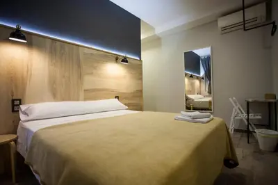 Cama o camas de una habitación en CC Atocha