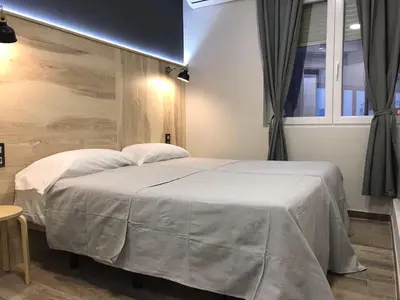 Cama o camas de una habitación en CC Atocha