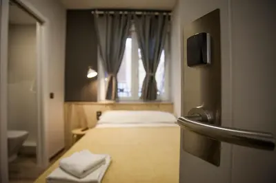 Cama o camas de una habitación en CC Atocha