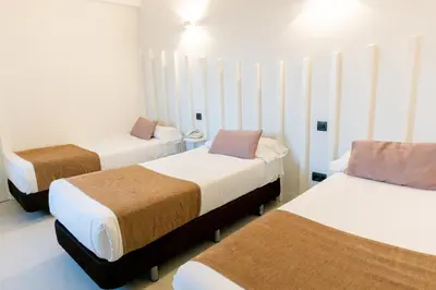 Cama o camas de una habitación en Hostal Gran Via 44