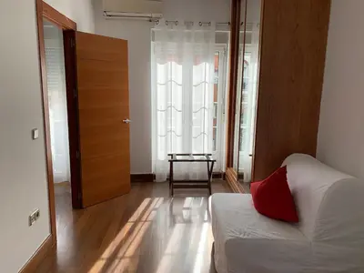 Cama o camas de una habitación en New Point Madrid Apartments