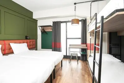 Cama o camas de una habitación en Generator Madrid