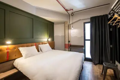 Cama o camas de una habitación en Generator Madrid