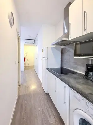 Una cocina o zona de cocina en Cómodo y agradable estudio en Madrid centro A2