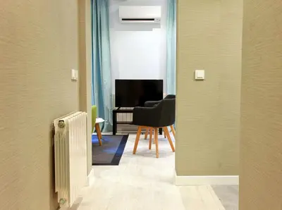 Zona de estar de Feelathome Madrid Suites Apartments