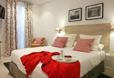 Cama o camas de una habitación en Feelathome Madrid Suites Apartments