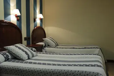 Cama o camas de una habitación en Hostal Ana Belen