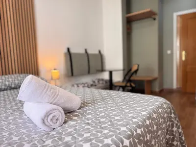 Cama o camas de una habitación en CH Rayuela