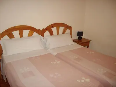 Cama o camas de una habitación en Hostal Zabala