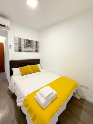 Cama o camas de una habitación en Comodo y agradable estudio en Madrid centro A5