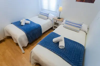 Cama o camas de una habitación en Cosy Apartment Malasaña