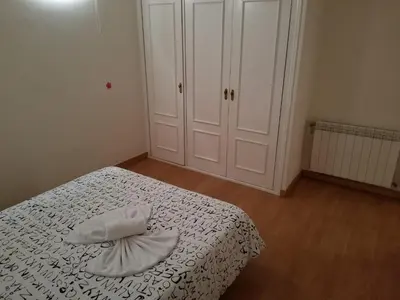 Cama o camas de una habitación en Casa Huésped Magdalena