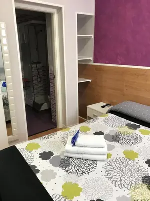 Cama o camas de una habitación en Casa Huésped Magdalena