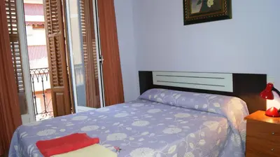 Cama o camas de una habitación en Casa Huésped Magdalena