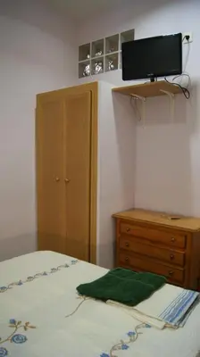 Cama o camas de una habitación en Casa Huésped Magdalena