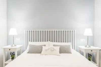 Cama o camas de una habitación en Waou La Latina I - Alquiler Corta Duración