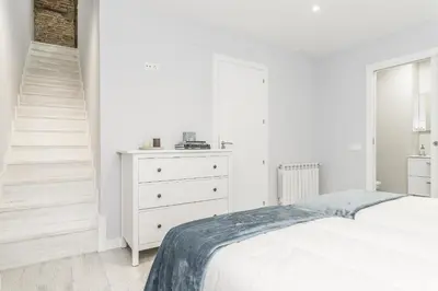 Cama o camas de una habitación en Waou La Latina I - Alquiler Corta Duración