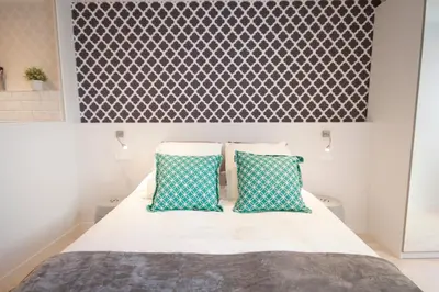 Cama o camas de una habitación en Loft de lujo a pasos del prado