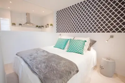 Cama o camas de una habitación en Loft de lujo a pasos del prado