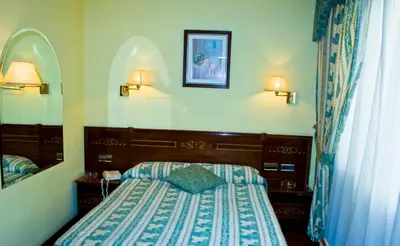 Cama o camas de una habitación en Hostal Centro Sol Madrid