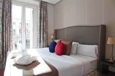 Cama o camas de una habitación en Boutike Cibeles