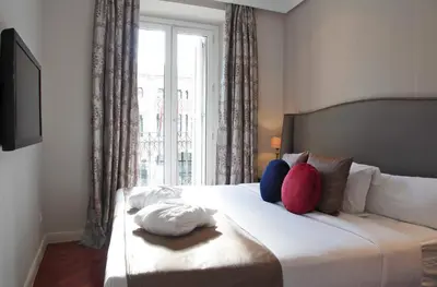 Cama o camas de una habitación en Boutike Cibeles