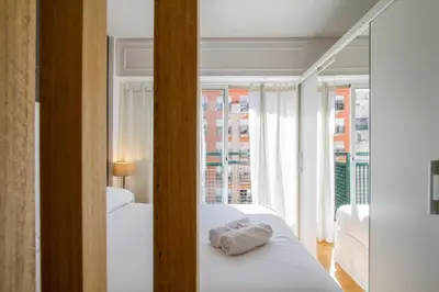 Cama o camas de una habitación en Puerta de Atocha - Acogedor estudio para 4 con piscina
