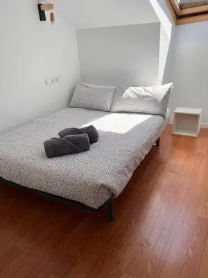 Cama o camas de una habitación en Onefam Madrid