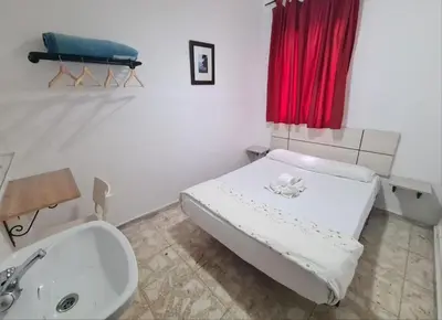Cama o camas de una habitación en Pensión Rivera