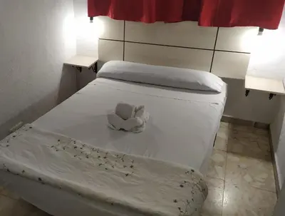 Cama o camas de una habitación en Pensión Rivera