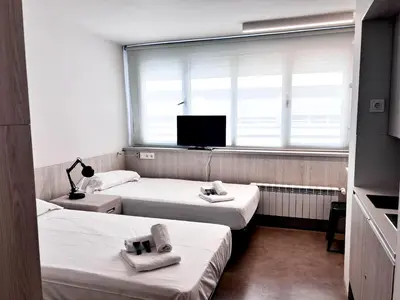 Cama o camas de una habitación en Residencia Universitaria Resa Claudio Coello