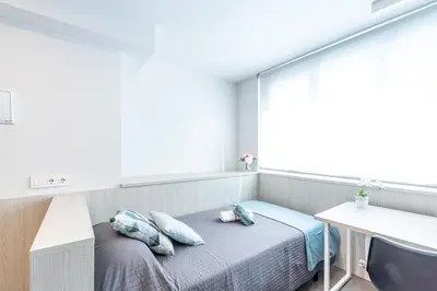Cama o camas de una habitación en Residencia Universitaria Resa Claudio Coello