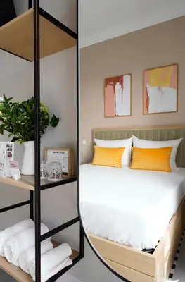 Cama o camas de una habitación en Numa Madrid Script