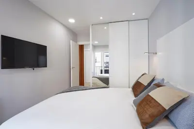 Cama o camas de una habitación en LEEWAYS APARTMENT in AVE MARÍA
