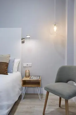 Cama o camas de una habitación en LEEWAYS APARTMENT in AVE MARÍA