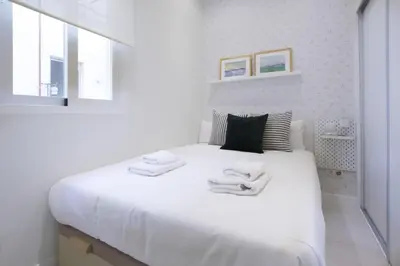 Cama o camas de una habitación en Excutive Salamanca Neighborhood