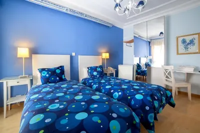 Cama o camas de una habitación en Hostal Adriano
