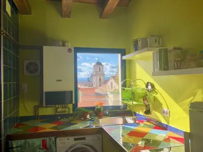 Una cocina o zona de cocina en Ático de Mowgli - SOL