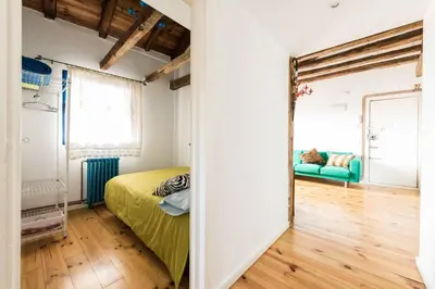 Cama o camas de una habitación en Ático de Mowgli - SOL