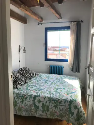 Cama o camas de una habitación en Ático de Mowgli - SOL