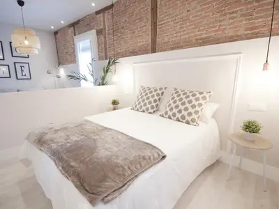 Cama o camas de una habitación en Oasis ii: lujo a pasos del prado
