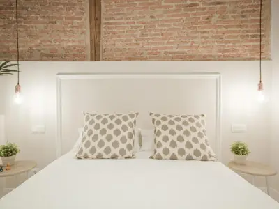 Cama o camas de una habitación en Oasis ii: lujo a pasos del prado