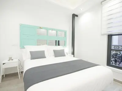 Cama o camas de una habitación en Apartamento nuevo y de lujo en puerta del sol