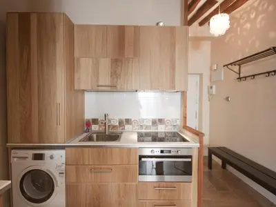 Una cocina o zona de cocina en Acogedor callao! 2hab/wifi/ac
