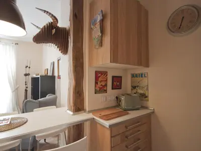 Una cocina o zona de cocina en Acogedor callao! 2hab/wifi/ac