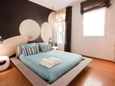 Cama o camas de una habitación en Gran apartamento de diseño @plazasanmiguel *lujo*